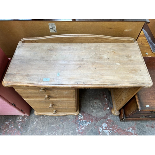 48 - A pine dressing table with four drawers