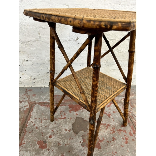 54 - A Victorian bamboo octagonal two tier side table