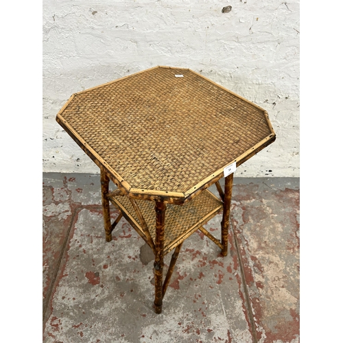 54 - A Victorian bamboo octagonal two tier side table