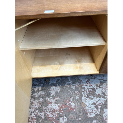 6 - A 1960s Meredew teak sideboard with four outer drawers, two cupboard doors and fall front