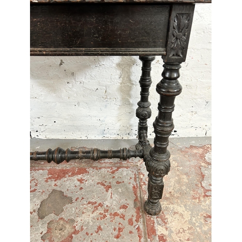 62 - A Victorian Gothic Revival carved oak rectangular side table with lower stretcher