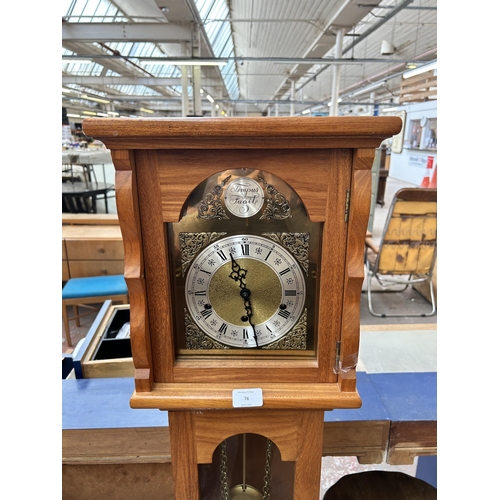 76 - An oak cased grandmother clock with brass Tempus Fugit face, pendulum, weights and key