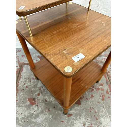 8 - A mid 20th century teak two tier side table