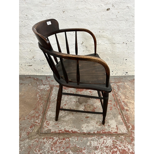 93 - An early/mid 20th century oak and beech captain's desk chair