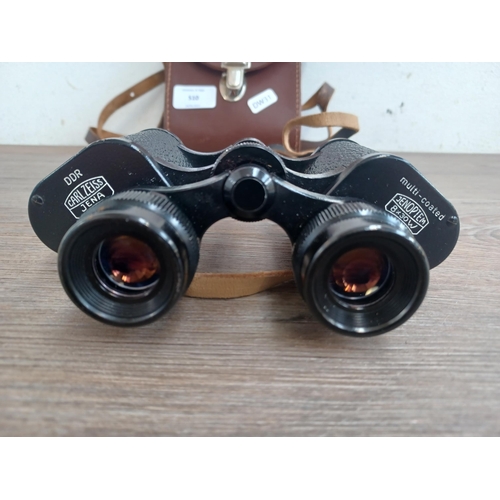 510 - A cased pair of Carl Zeiss Jenoptem 8 x 30w binoculars