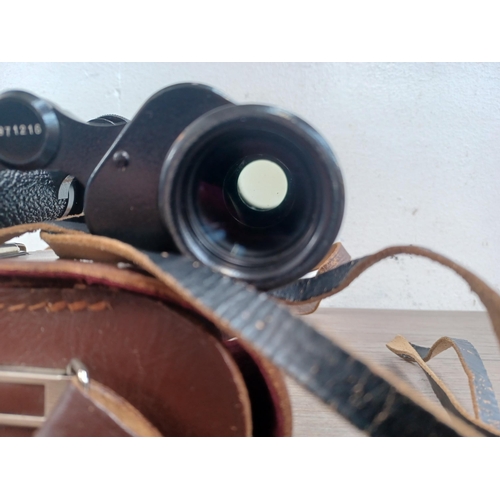 510 - A cased pair of Carl Zeiss Jenoptem 8 x 30w binoculars