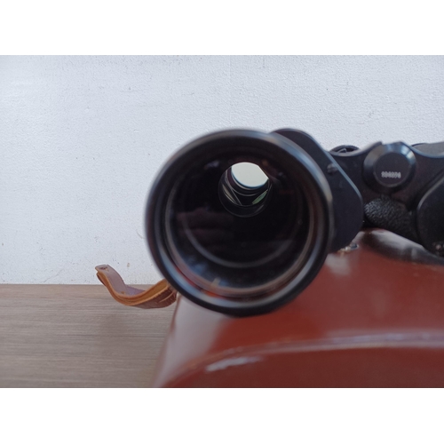 512 - A cased pair of Carl Zeiss Jenoptem 10 x 50w binoculars