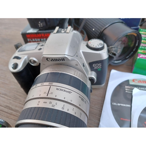 518 - A collection of photography equipment to include Canon EOS 500N 35mm SLR camera fitted with Sigma 28... 