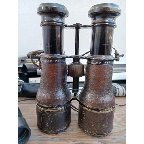 518A - Four items, one pair of early 20th century French Colmont binoculars marked broad arrow S.3 M.4342, ... 