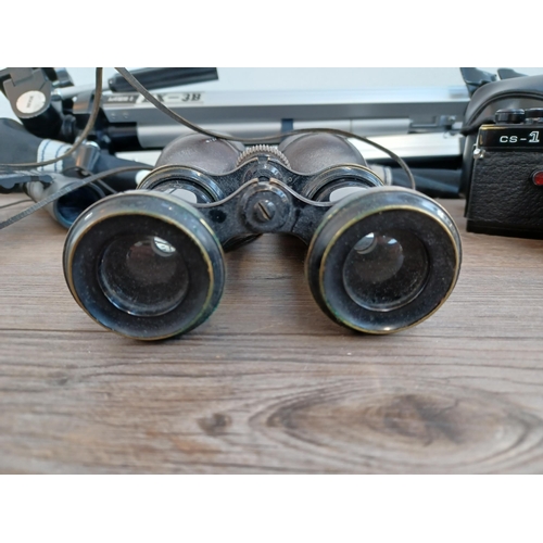 518A - Four items, one pair of early 20th century French Colmont binoculars marked broad arrow S.3 M.4342, ... 