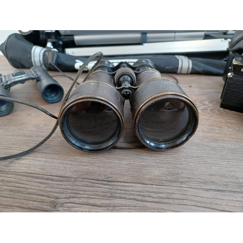 518A - Four items, one pair of early 20th century French Colmont binoculars marked broad arrow S.3 M.4342, ... 