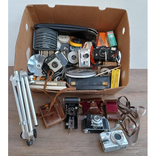 522 - A collection of items to include 1950s Kodak Retina Ia folding camera for 35mm film, Sony Cyber-shot... 