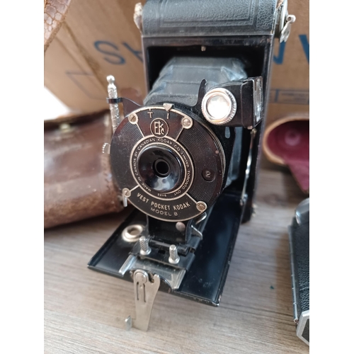 522 - A collection of items to include 1950s Kodak Retina Ia folding camera for 35mm film, Sony Cyber-shot... 