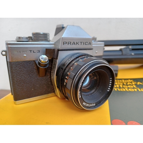 526 - A collection of items to include cased late 1970s Pentacon Praktica Super TL3 35mm SLR camera, cased... 