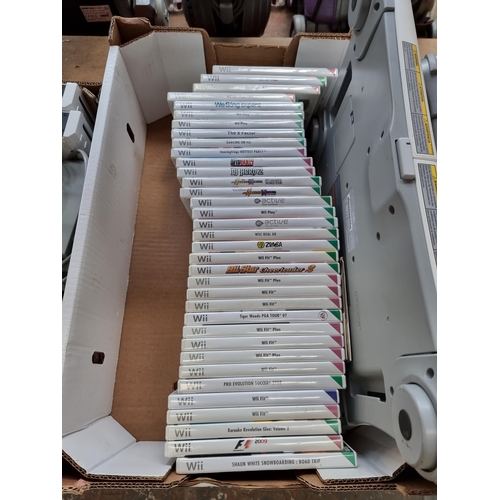 594 - Various Nintendo Wii games, consoles and accessories