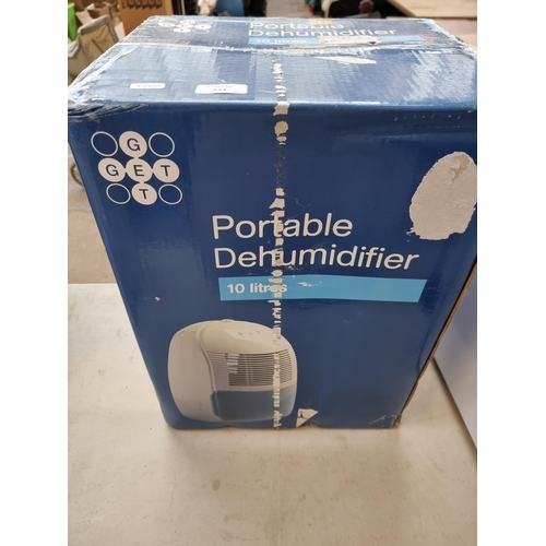 614 - Two boxed items, one 6L mini fridge and one 10L portable dehumidifier