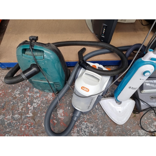 617 - Five cleaners to include Vax Essentials Pet upright bagless vacuum cleaner etc.