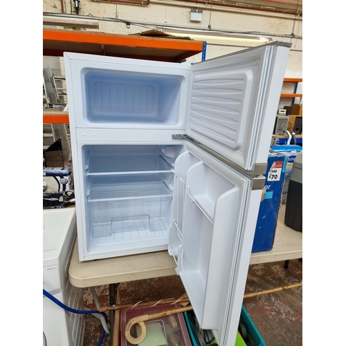 631 - A Montpellier MAB2031W under counter fridge freezer - approx. 84cm high x 48cm wide