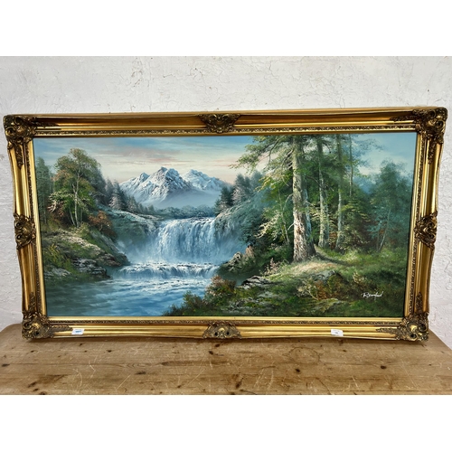 146 - A gilt framed oil on canvas of a landscape scene by R. Danford - approx. 73cm high x 134cm wide