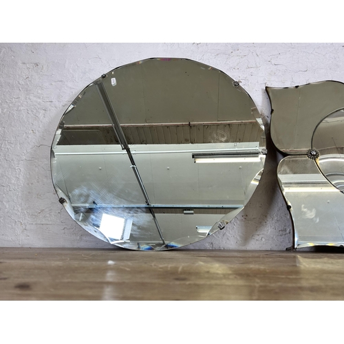 155 - Two mid 20th century frameless bevelled edge wall hanging mirrors