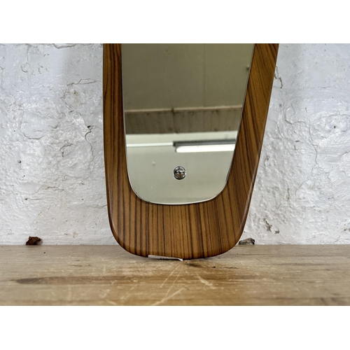 159 - A mid 20th century teak framed asymmetrical wall mirror - approx. 33cm high x 74cm wide