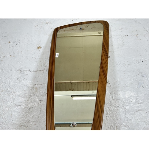 159 - A mid 20th century teak framed asymmetrical wall mirror - approx. 33cm high x 74cm wide