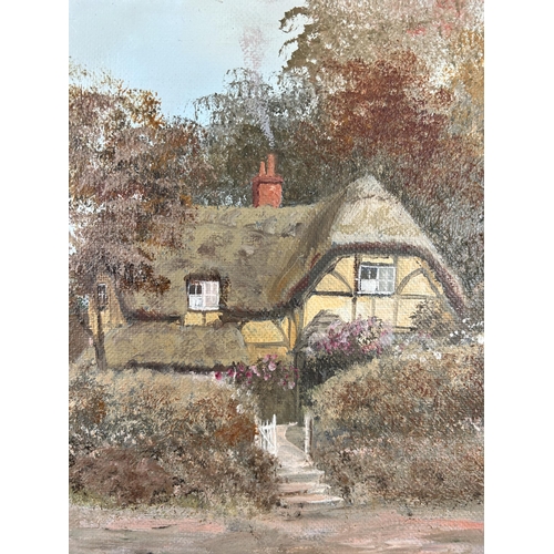 169 - A 20th century gilt framed oil on board of a cottage, signed Glynn Carter - approx. 39cm high x 50cm... 