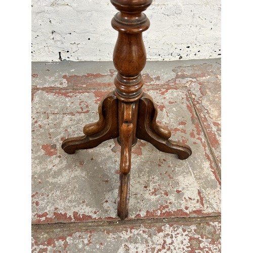 80 - A 19th century mahogany octagonal pedestal side table