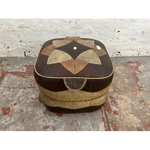 101 - A Moroccan brown leather footstool