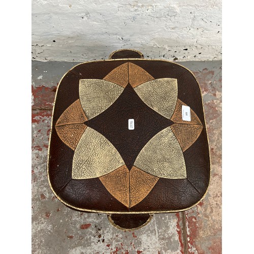 101 - A Moroccan brown leather footstool