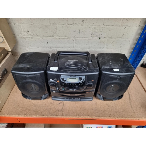 529 - A Philips AZ2100/05 stereo cassette recorder/three band radio/CD player with removable speakers