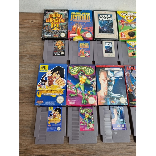 559 - Thirteen boxed Nintendo NES game cartridges to include, Star Wars, Terminator 2, Double Dragon III, ... 