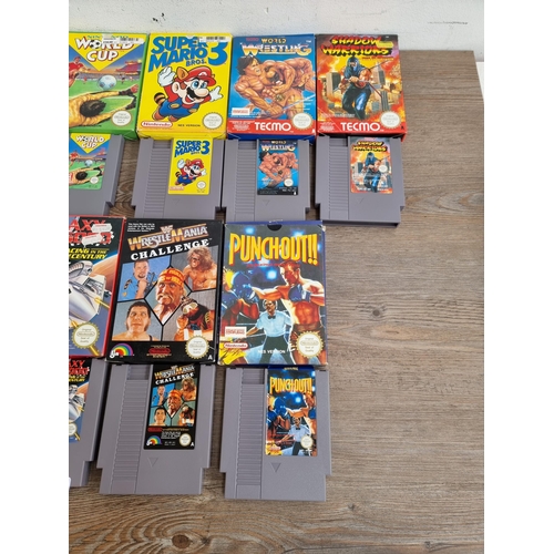 559 - Thirteen boxed Nintendo NES game cartridges to include, Star Wars, Terminator 2, Double Dragon III, ... 