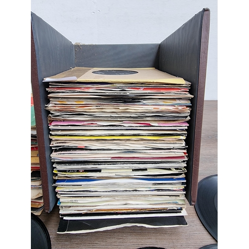 561 - A record case containing a collection of 7