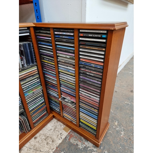 565 - Two storage units containing a collection of CDs