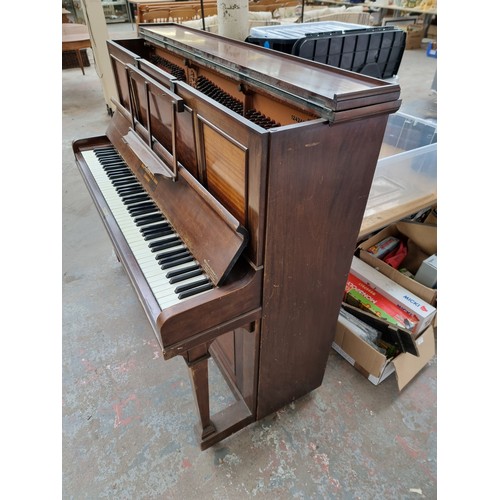 542A - An early 20th century mahogany John Broadwood & Sons upright piano