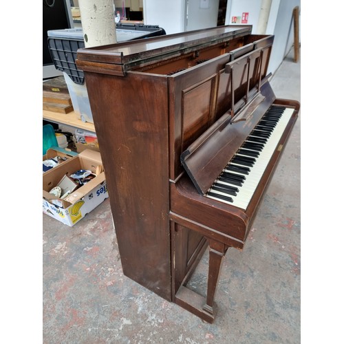 542A - An early 20th century mahogany John Broadwood & Sons upright piano