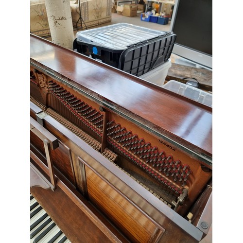 542A - An early 20th century mahogany John Broadwood & Sons upright piano