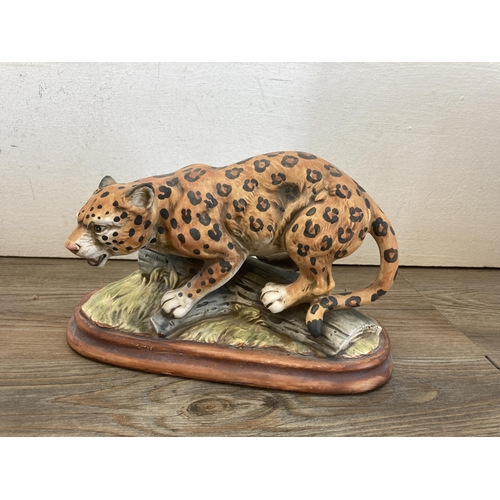 263 - Three ceramic wild cat figurines - largest approx. 16cm high