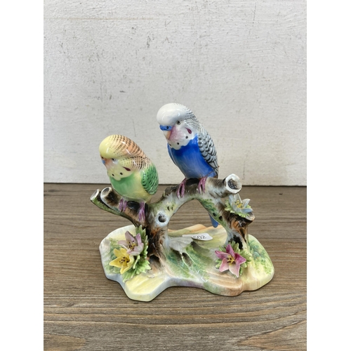 268 - Seven ceramic bird figurines to include Crown Staffordshire no. 277 Long Tail Tit, Beswick Wren, Roy... 