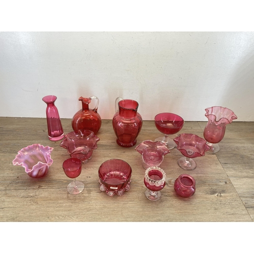 273 - A collection of Victorian and later cranberry glassware