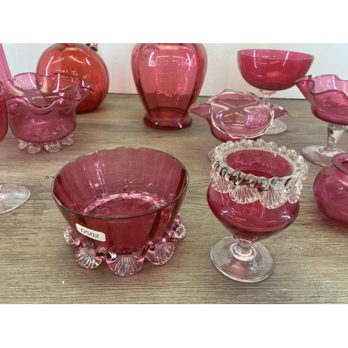 273 - A collection of Victorian and later cranberry glassware