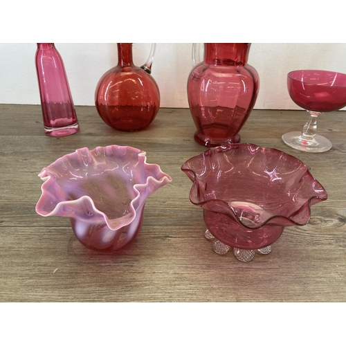 273 - A collection of Victorian and later cranberry glassware