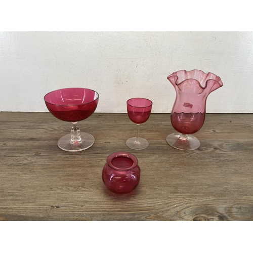 273 - A collection of Victorian and later cranberry glassware