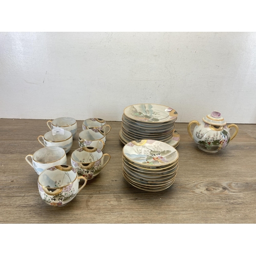 281 - A collection of Japanese hand painted eggshell porcelain teaware