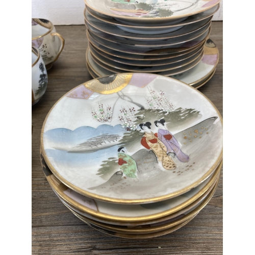 281 - A collection of Japanese hand painted eggshell porcelain teaware