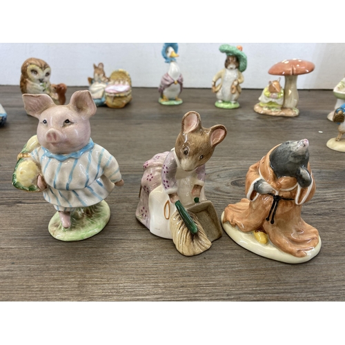 303 - Eleven ceramic and resin animal figurines to include Royal Albert The Wind in the Willows Mole AW4, ... 