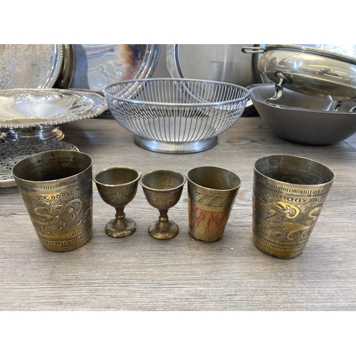 316 - A collection of metalware to include ECO hammered pewter tankard, Middle Eastern brassware, silver p... 