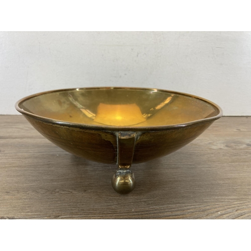 319 - An Arts & Crafts copper semi-globular shaped bowl sitting on three ball feet - approx. 10cm high x 2... 