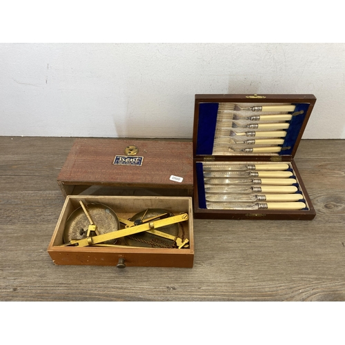 323 - Five vintage cased items, four silver plated cutlery sets and one set of brass Trent Scales